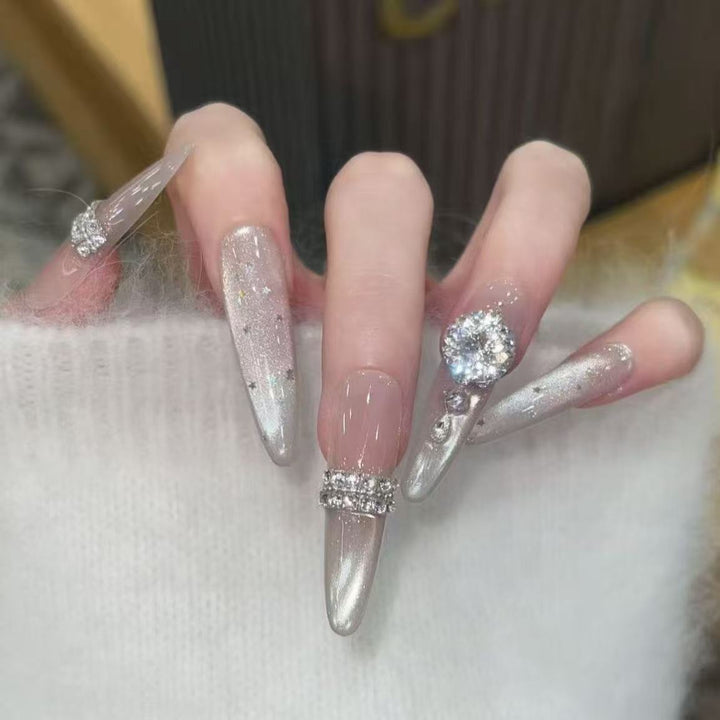 Artistic Stiletto Press-On Nail Art with Glimmering Accents Bowlift