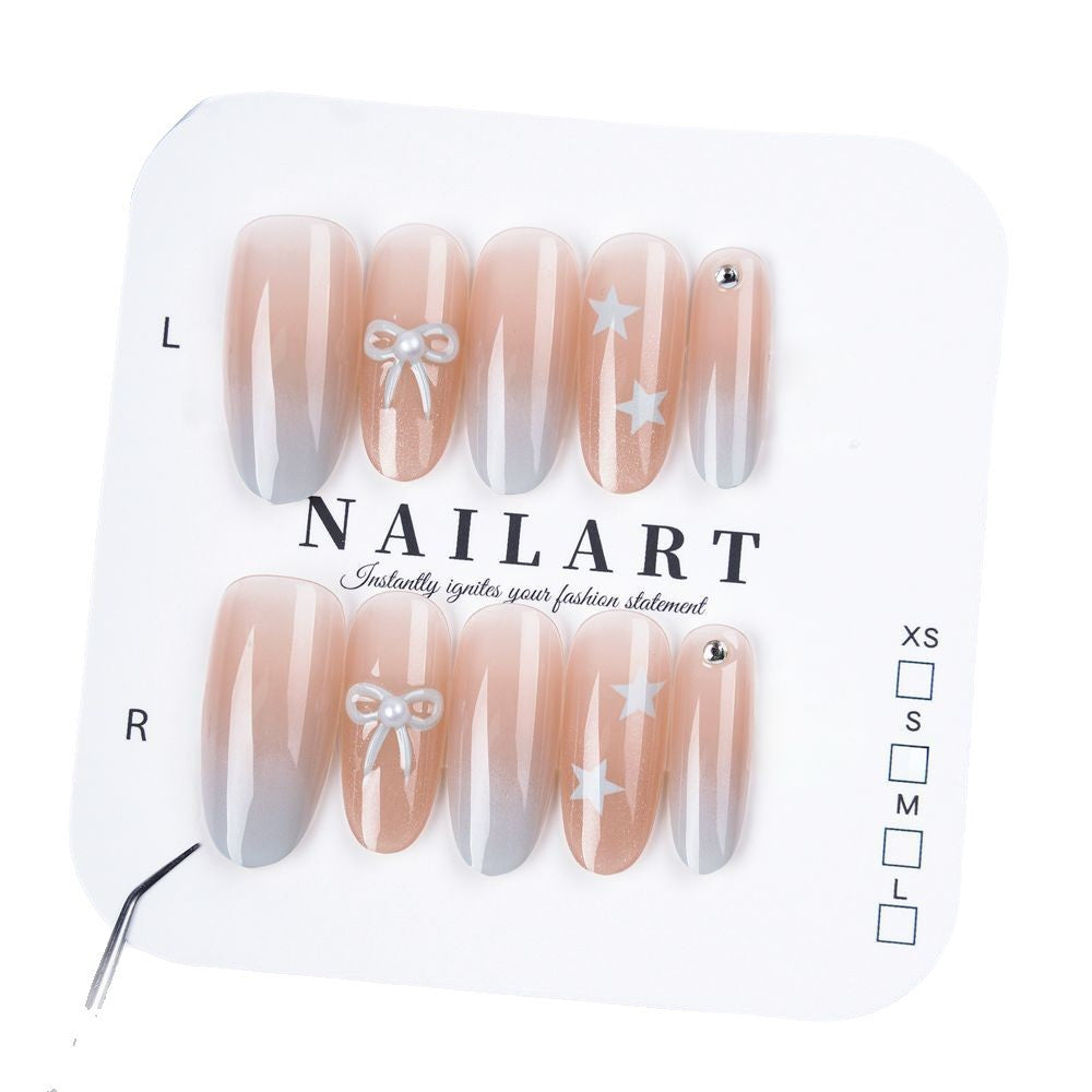 Artificial nails with elegant ombre effect and decorative accents Bowlift