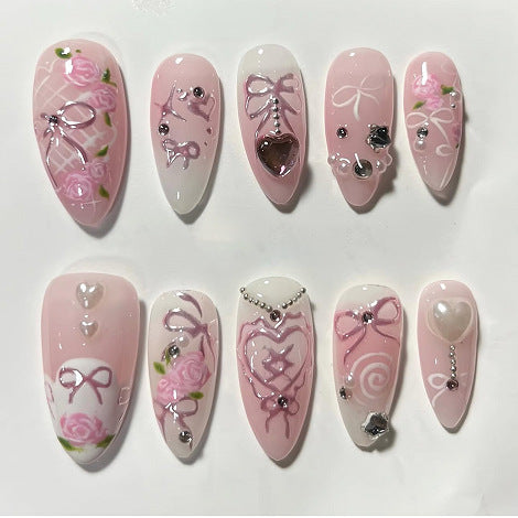 Artful Nail Art with Romantic Rose and Bow Designs Bowlift