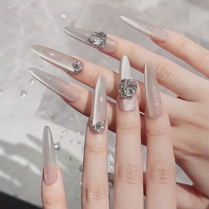 Acrylic nail set with glitter design and elegant 3D applications Bowlift