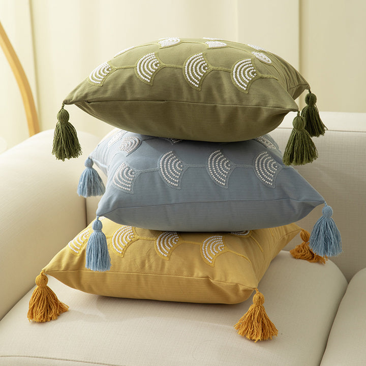 Embroidered decorative pillow with tassels and geometric pattern Bowlift