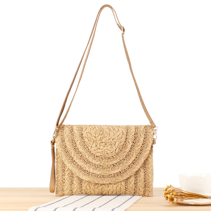 Shoulder bag made of braided straw with structured design Bowlift