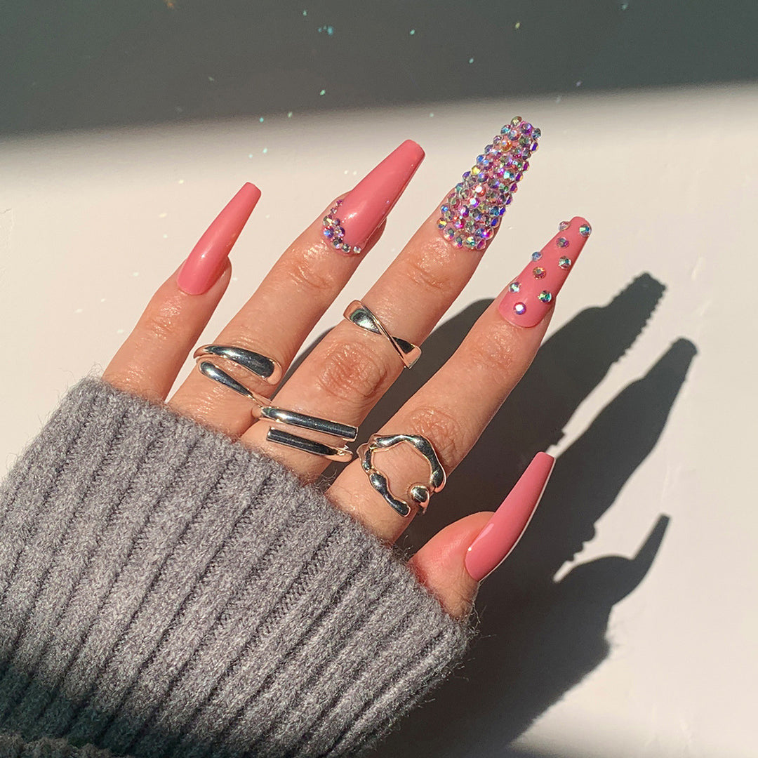 Artful Nail Extensions with Decorative Rhinestone Embellishments Bowlift
