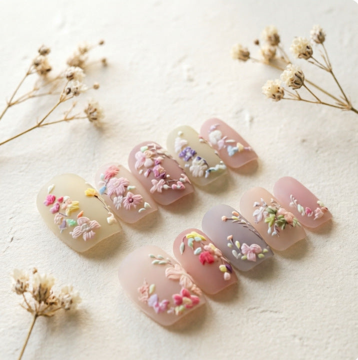 Art nail design with floral motifs Bowlift