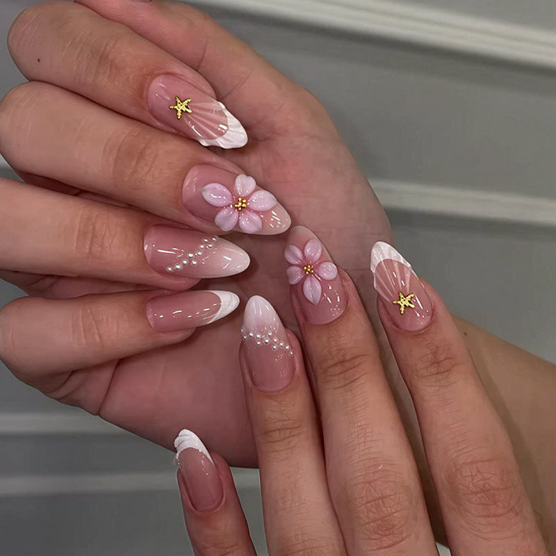Artifical nail set with delicate flower and decorative elements Bowlift