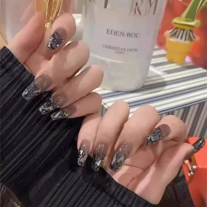 Elegant Nail Art with Glitter and Rhinestones Bowlift