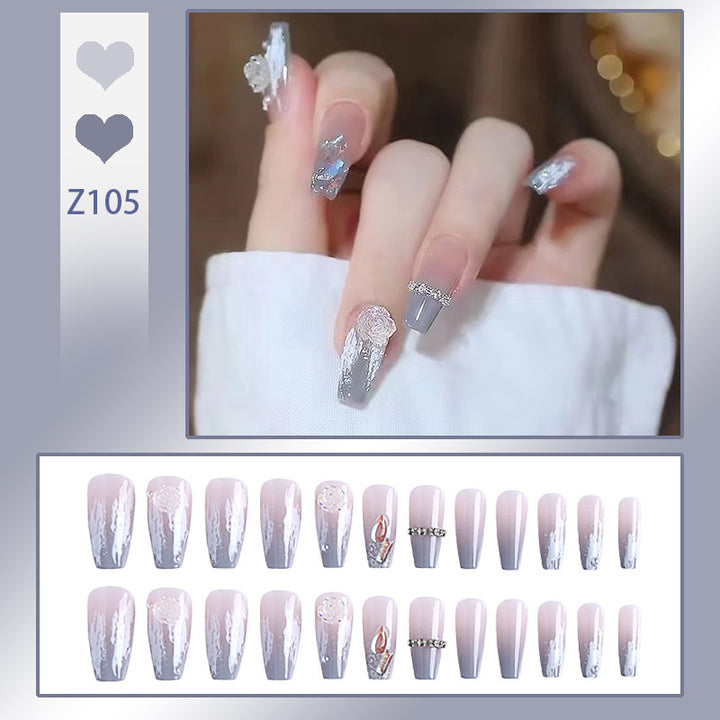Artificial nail set with delicate rose and glitter decorations Bowlift