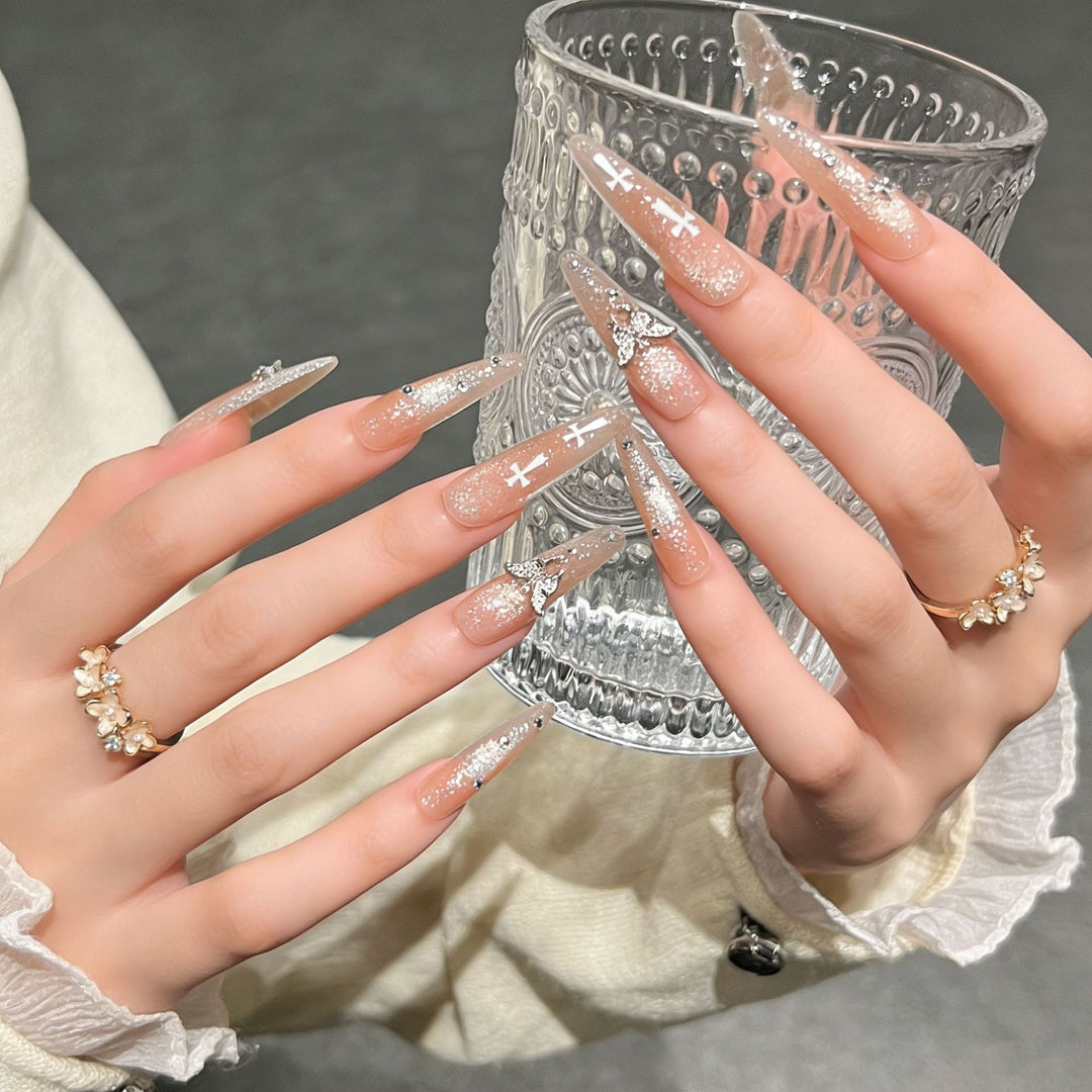 Elegant Stiletto Press-On Nail Extensions with Gem Accents Bowlift