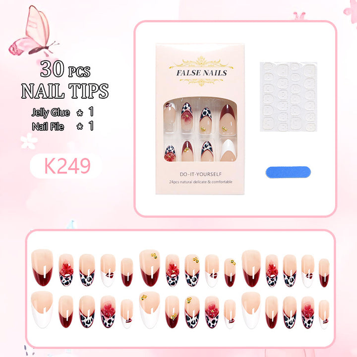 Artificial nail set with elegant floral patterns and glamorous details Bowlift