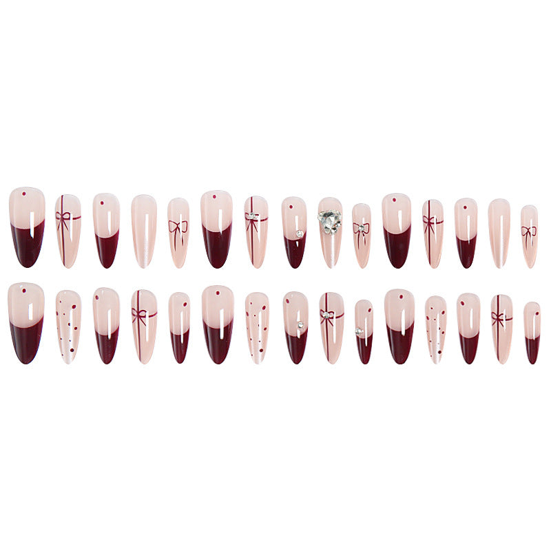 Artificial nail set with elegant bow and glitter details Bowlift