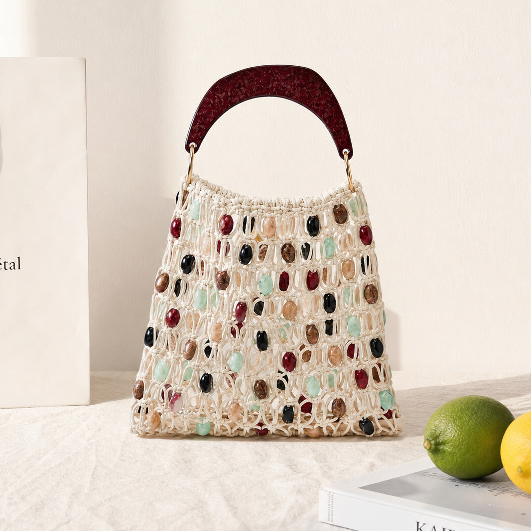 Handcrafted designer shoulder bag with unique stone accents Bowlift