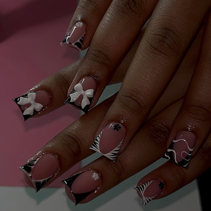 Decorative Press-On Nail Art with Floral and Graphic Designs Bowlift