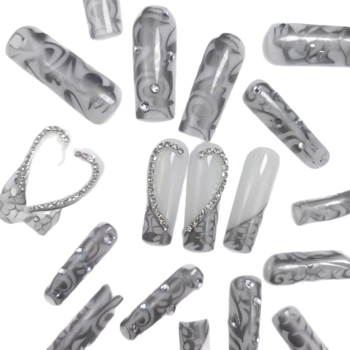 Artificial nails with elegant 3D pattern and radiant rhinestone decorations Bowlift