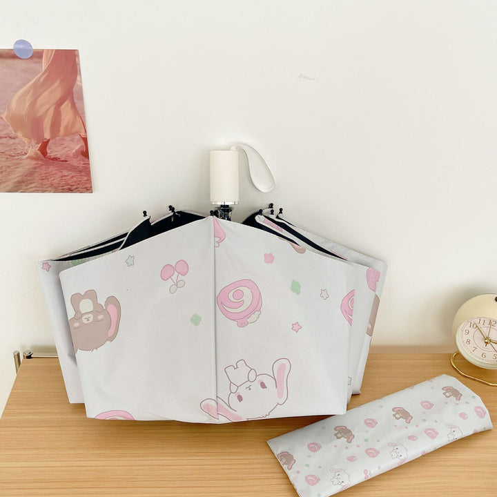 Women's Automatic Folding Umbrella with Playful Animal Design Bowlift