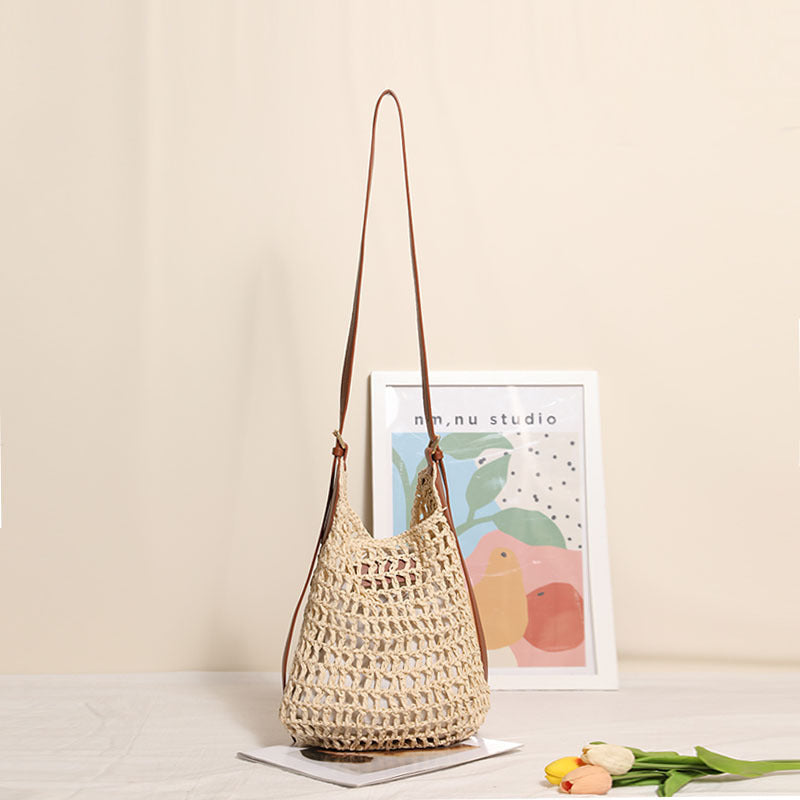Hand-knotted shoulder bag with metal appliqués Bowlift