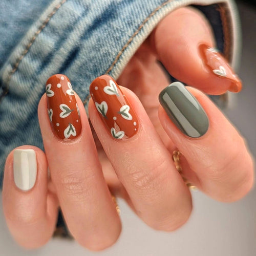 Elegant artificial nails with creative heart decorations Bowlift