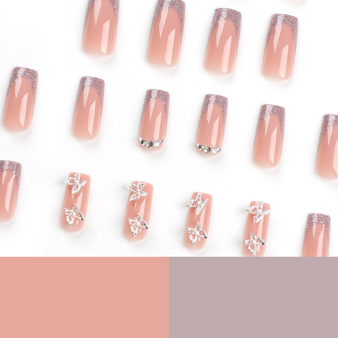 Artful Nail Extensions with Glitter and Decorative Accents Bowlift