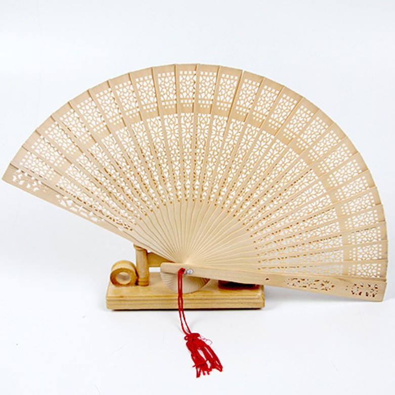 Ladies fan made of delicate plastic with artistic cut pattern Bowlift