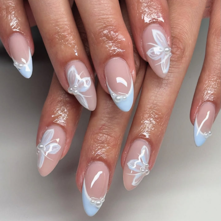 Elegant artificial nails with floral accents and glamorous design Bowlift