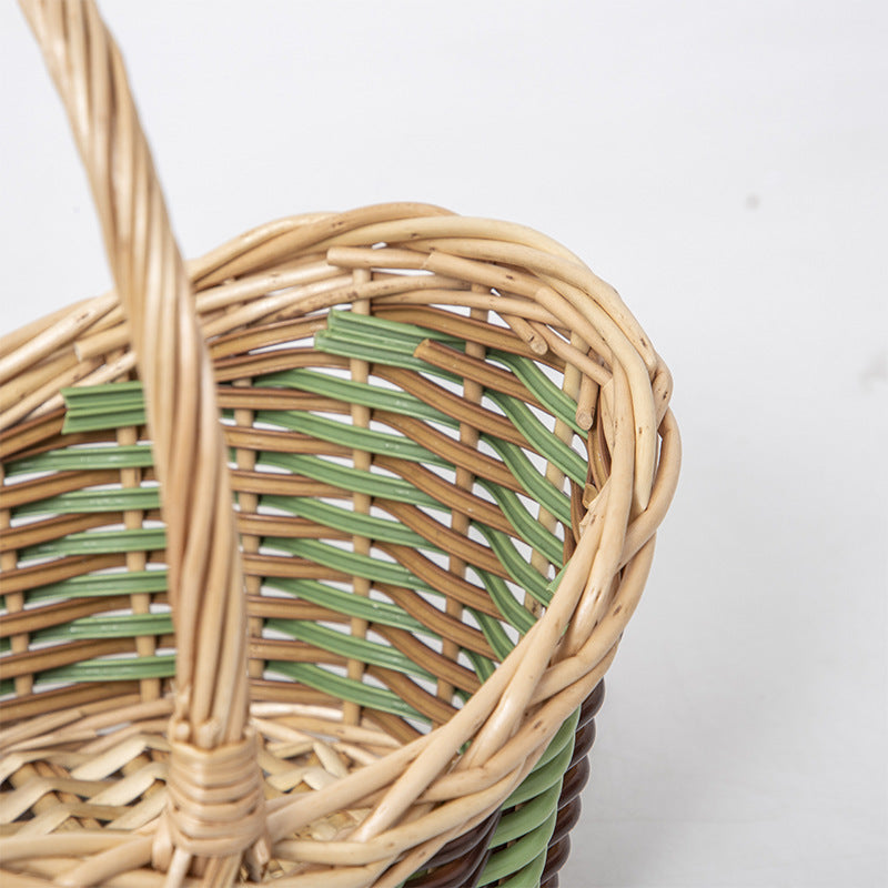 Basket with ergonomic carrying handle