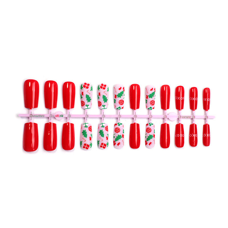 Artificial nail set with festive Christmas designs and glamorous glitter Bowlift