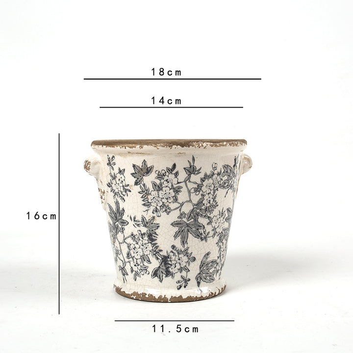 Decorative flower pot with floral embellishments Bowlift