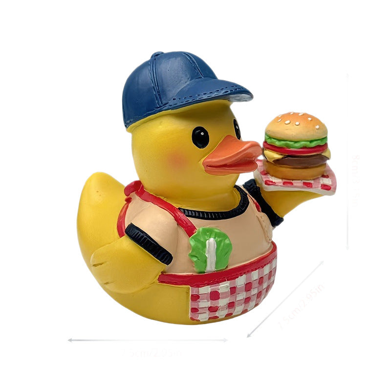 Funny rubber duck as grill master Bowlift