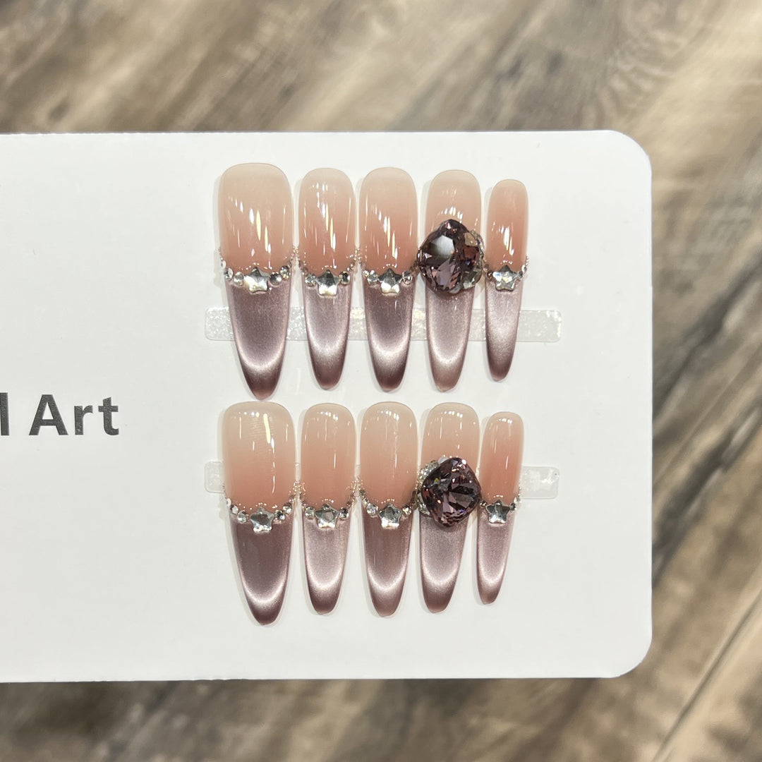 Elegant Stiletto Press-On Nail Set with Decorative Accents Bowlift