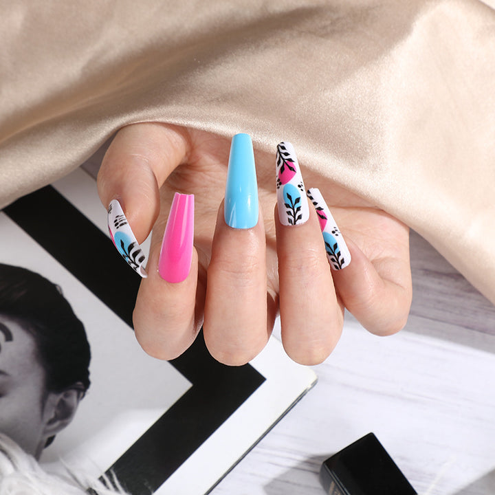 Artificial nails with floral design and creative accents Bowlift