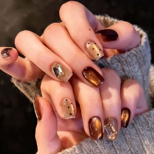 Acrylic nail set with elegant ombre designs and sparkling accents Bowlift
