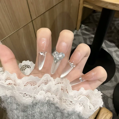 Artificial nail set with elegant tips and crystal accents Bowlift