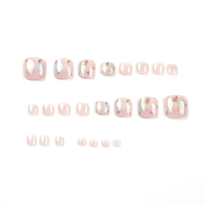 Artful toenail art with elegant marble and gold accents Bowlift