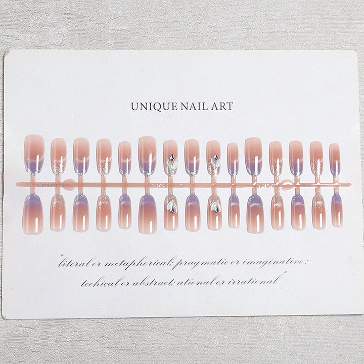 Acrylic nail set with elegant glitter effect and beautified embellishments Bowlift
