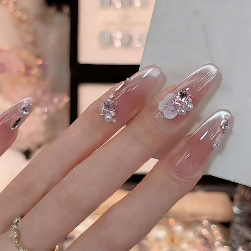 Nail art set with glamorous 3D applications and elegant floral decorations Bowlift