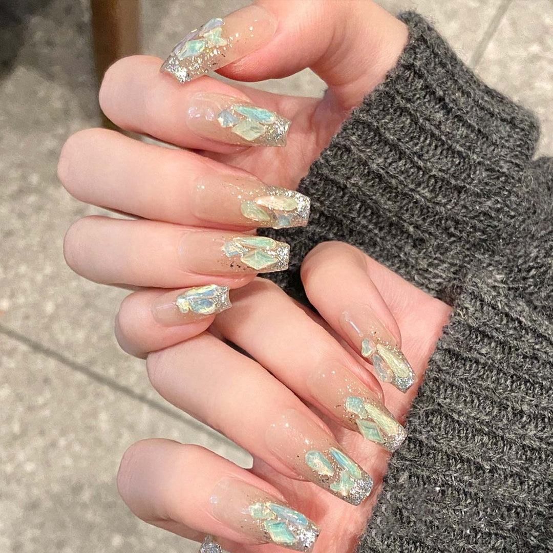 Glamorous nail tips with glitter accents Bowlift