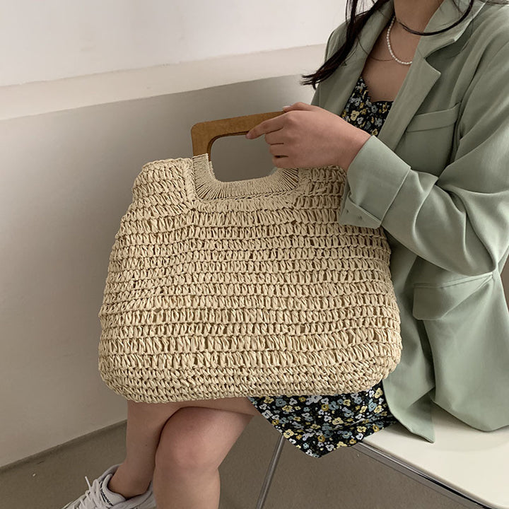 Designer handbag with practical wooden handle Bowlift