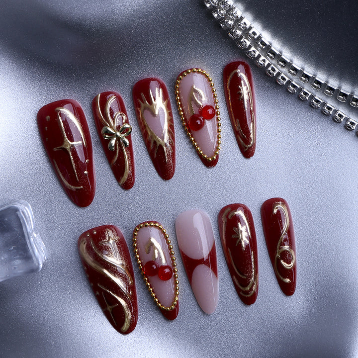 Artificial nails with elegant gold design Bowlift