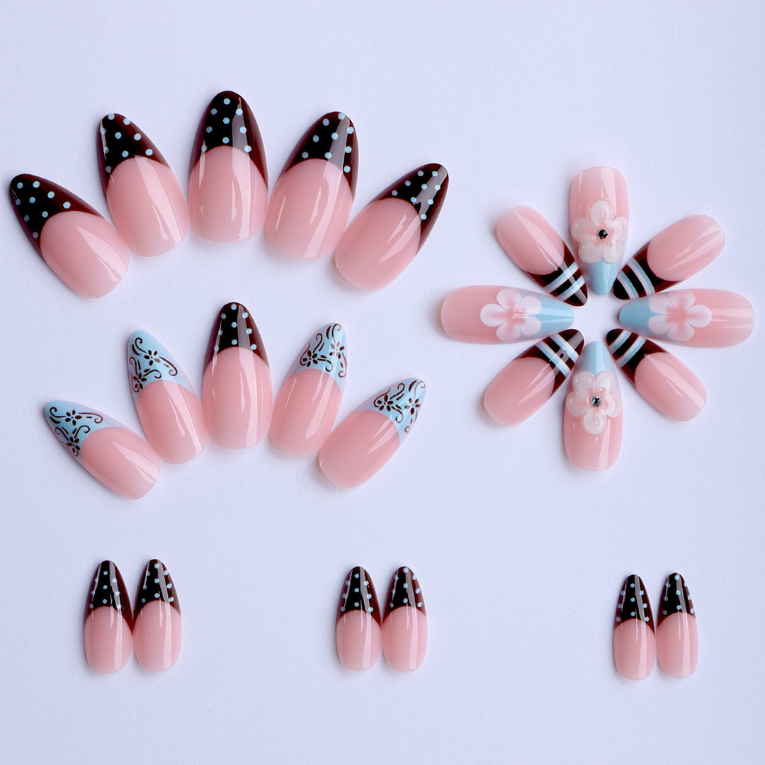Artificial nails with creative floral design and elegant accent colors Bowlift