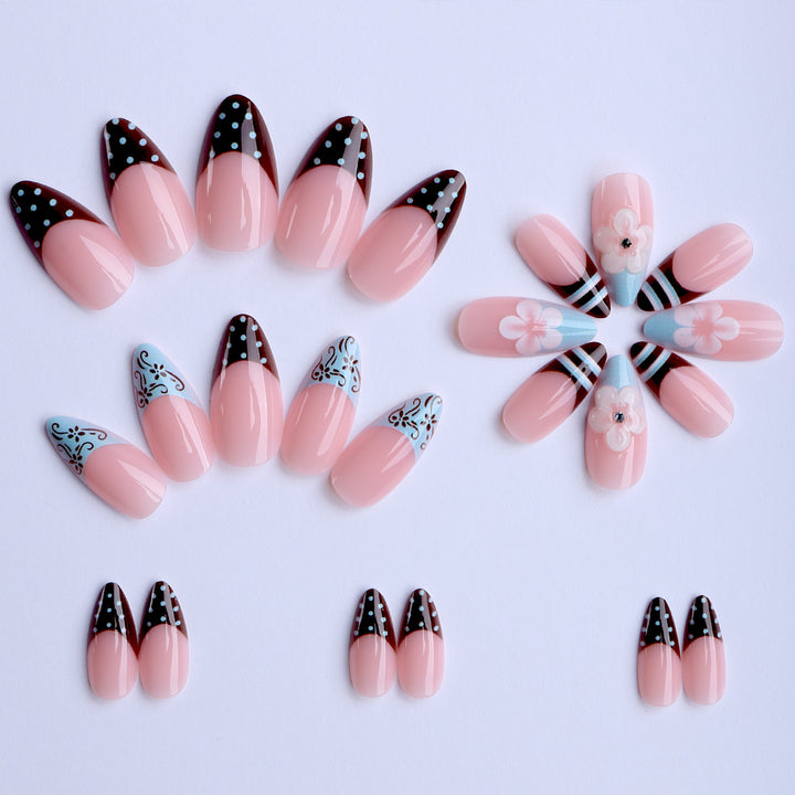 Artificial nails with creative floral design and elegant accent colors Bowlift