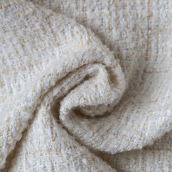 Square cushion cover made of textured bouclé blend with decorative piped seam Bowlift