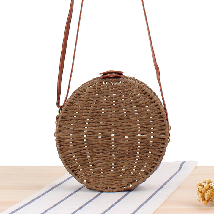 Round basket bag with leather accents Bowlift