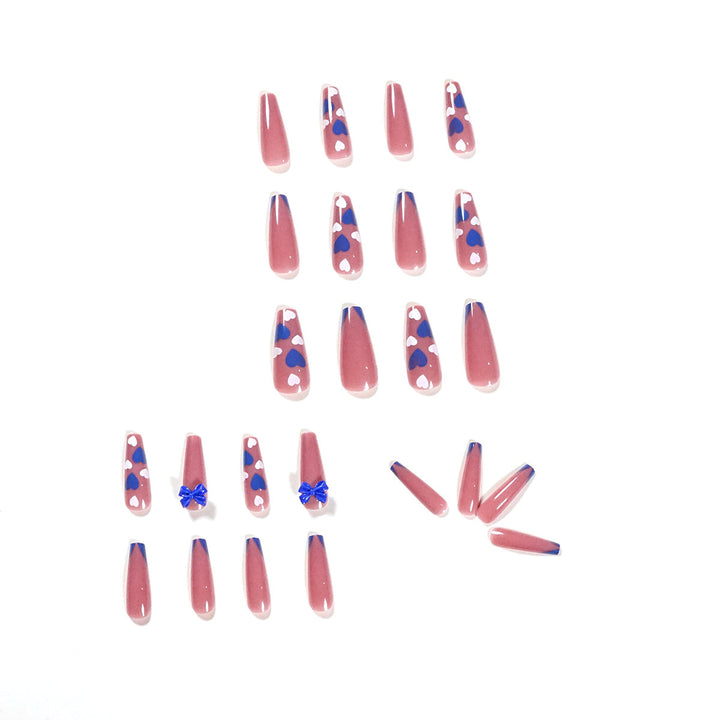 Artful stiletto nails with modern heart and bow motifs Bowlift
