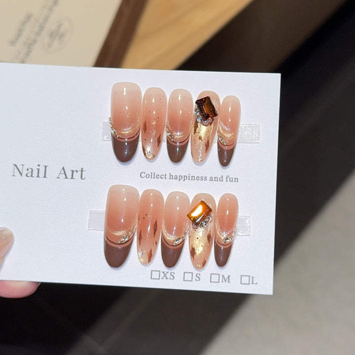 Artificial nails with elegant glitter and gold accent design Bowlift