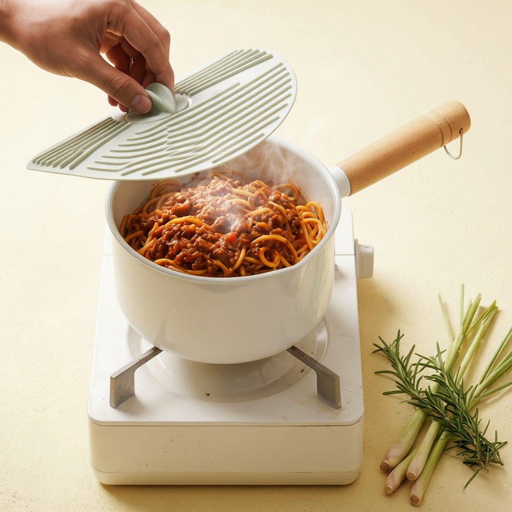 Silicone kitchen lid with innovative steam valve Bowlift