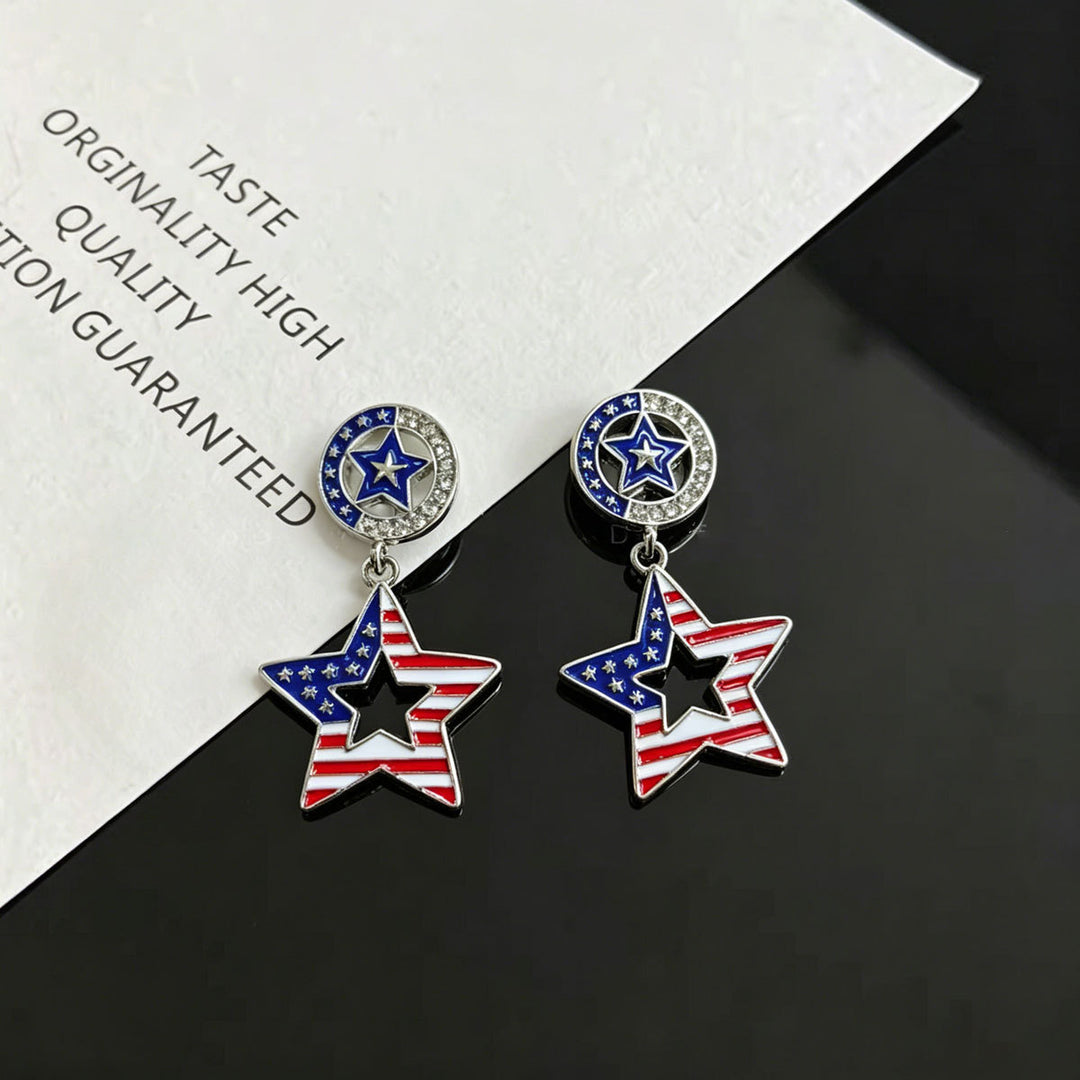 Ladies hanging earrings with star pendant and enamel flag motif Bowlift