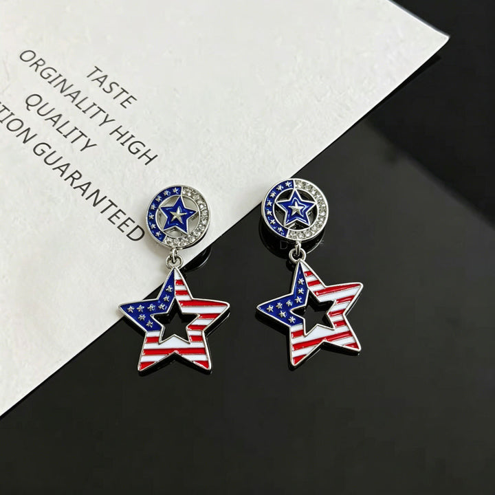 Ladies hanging earrings with star pendant and enamel flag motif Bowlift