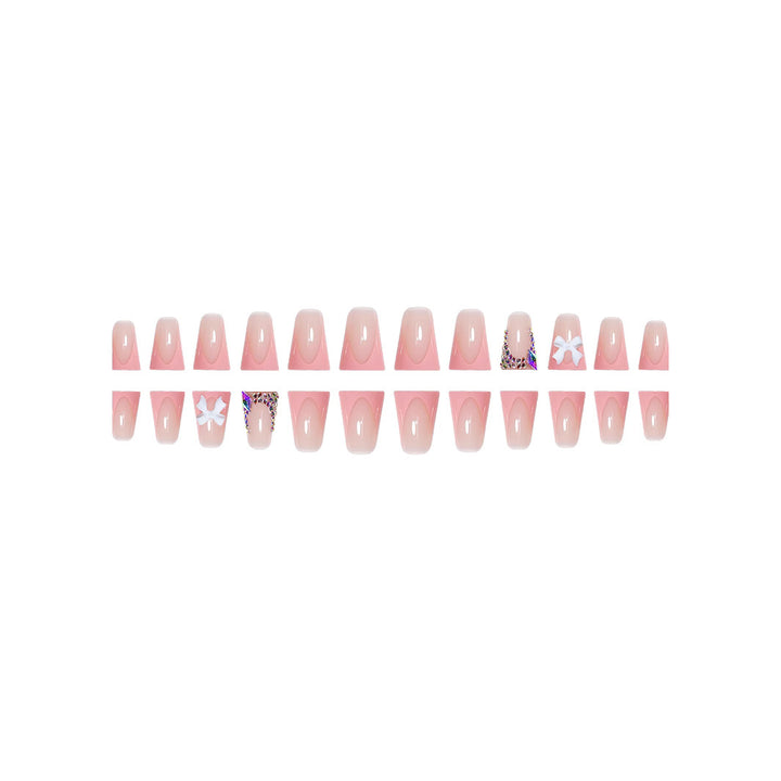 Decorative Acrylic Nail Enhancements with Bow and Rhinestone Accents Bowlift