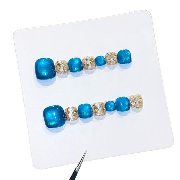 Art Nail Design with Shimmering Accents and Sparkling Rhinestone Details Bowlift