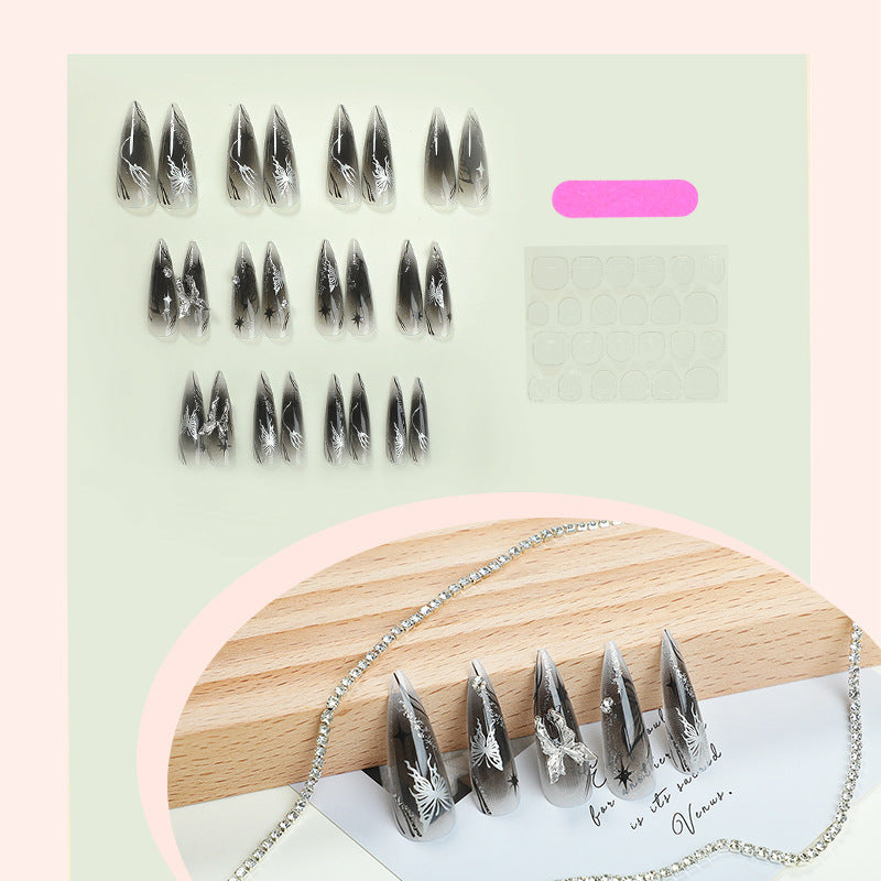 Artificial nail set with elegant floral design and sparkling accents Bowlift