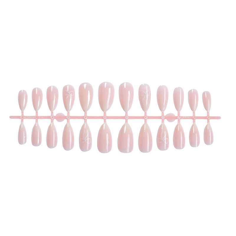 Artificial nail set with elegant designs and subtle accents Bowlift